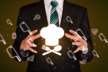 Hand holding food related icons