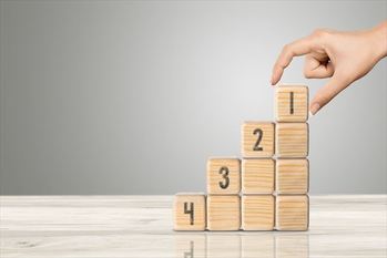 Task priority concept. Set of Wooden cubes 