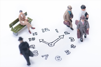 時計とビジネスマン