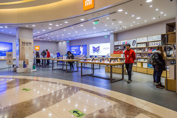 中国経済,M&A,提携,上場