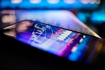 A mobile device being used to display business data.