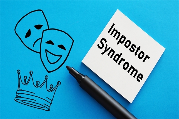 Impostor Syndrome is shown using the text picture of masks and crown