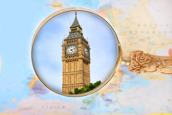 Map of Europe with magnifying glass looking in on Big Ben in London, England